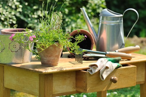 A Crouch End gardener using PPE during maintenance work