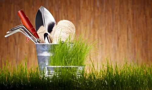 Professional gardeners assessing outdoor hazards before starting